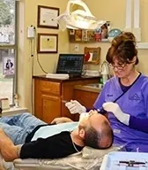 A Boerne Dental Center team member treating a patient.
